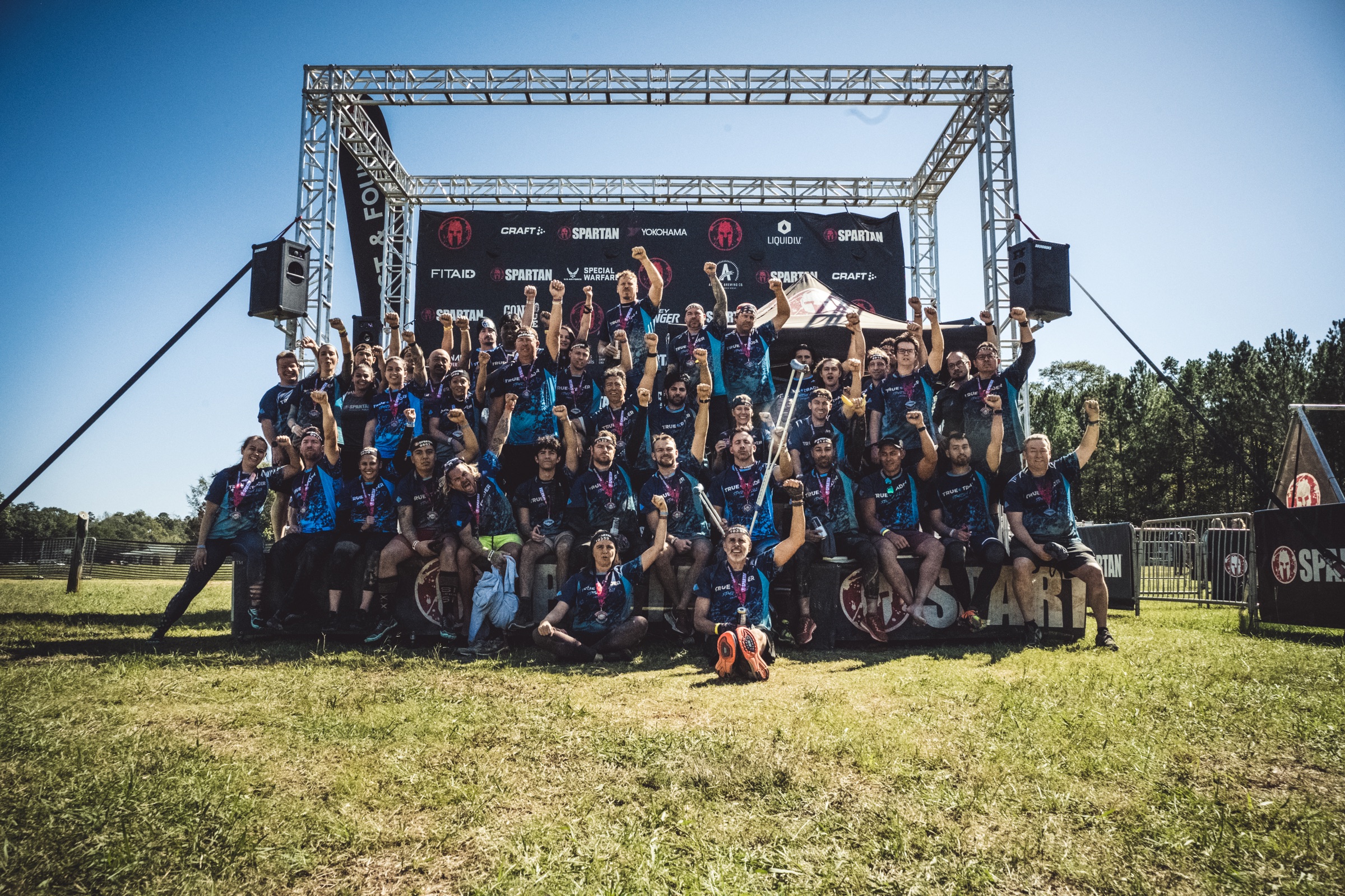 The TrueTrader community together after a Spartan Race