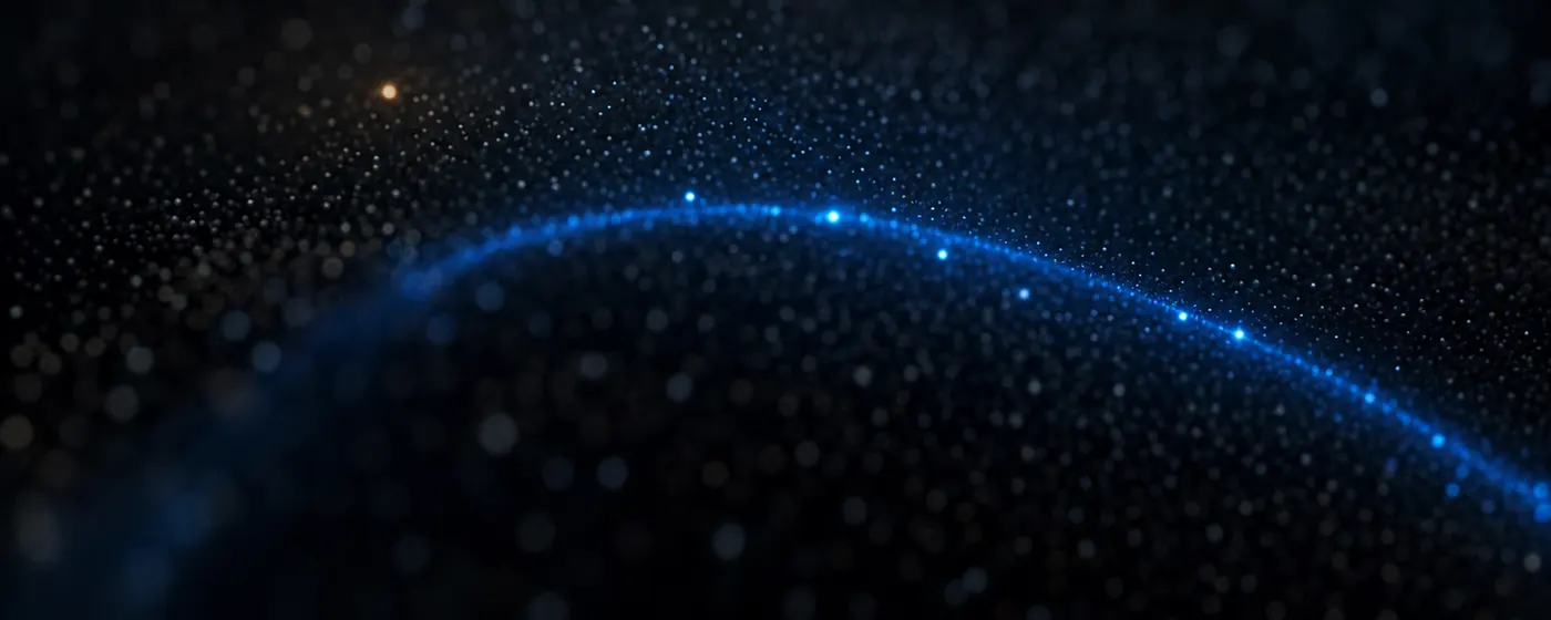 An abstract field of many thousands of faint grey points in darkness, crossed by a sweep of blue light that picks out a small handful of them and leaves the rest dim.